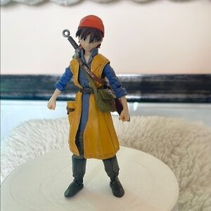 Adventure Figure with Yellow Coat and Red Hat